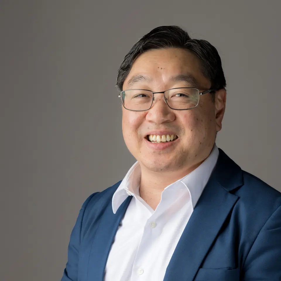 Haloo's Lawyer Partner, J.J Lee on a grey background